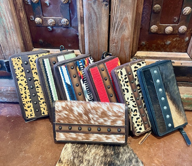 These wallet are the perfect size for a person onn the go --- put it in your bag or carry it as a wristlet